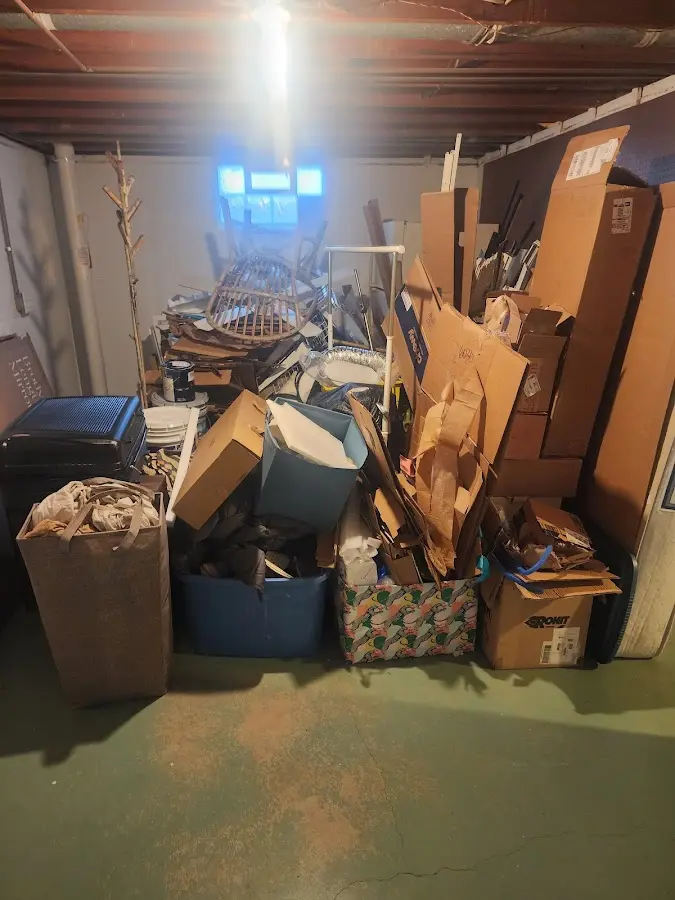 Roll-off dumpster container at job site for Cleanout Dumpster Rental in Viera East